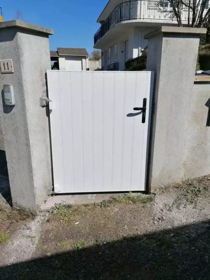 Porte de garage à Séreilhac